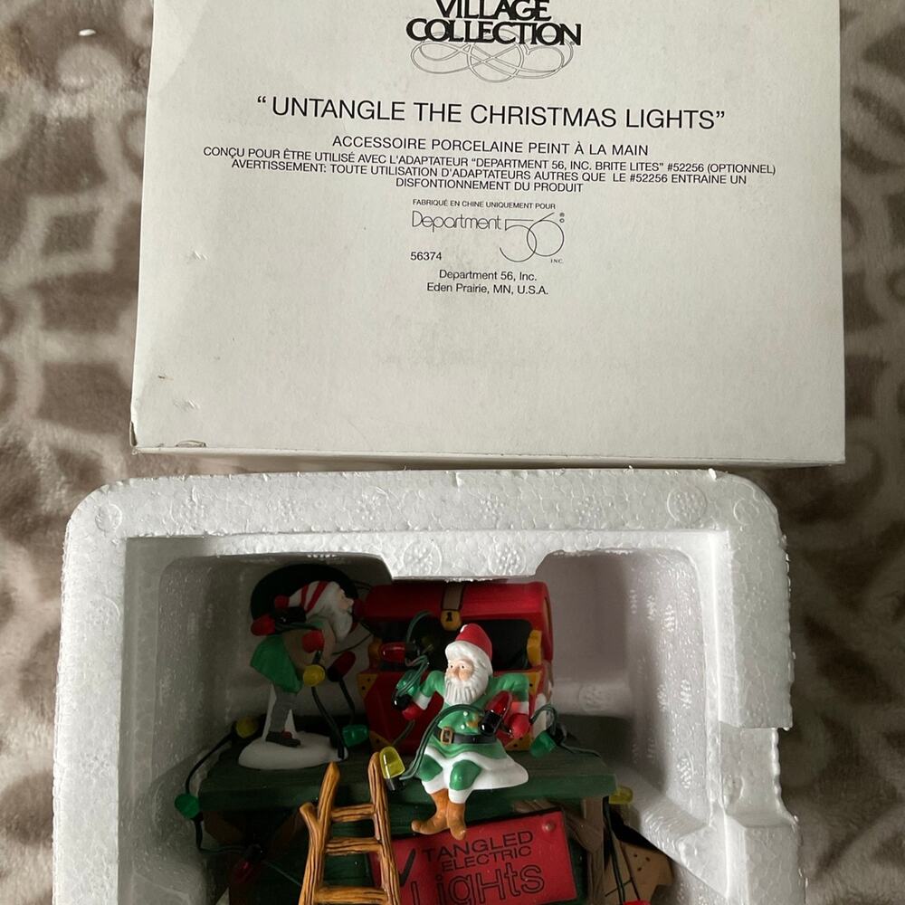 Department 56 untangled the Christmas lights perfect condition